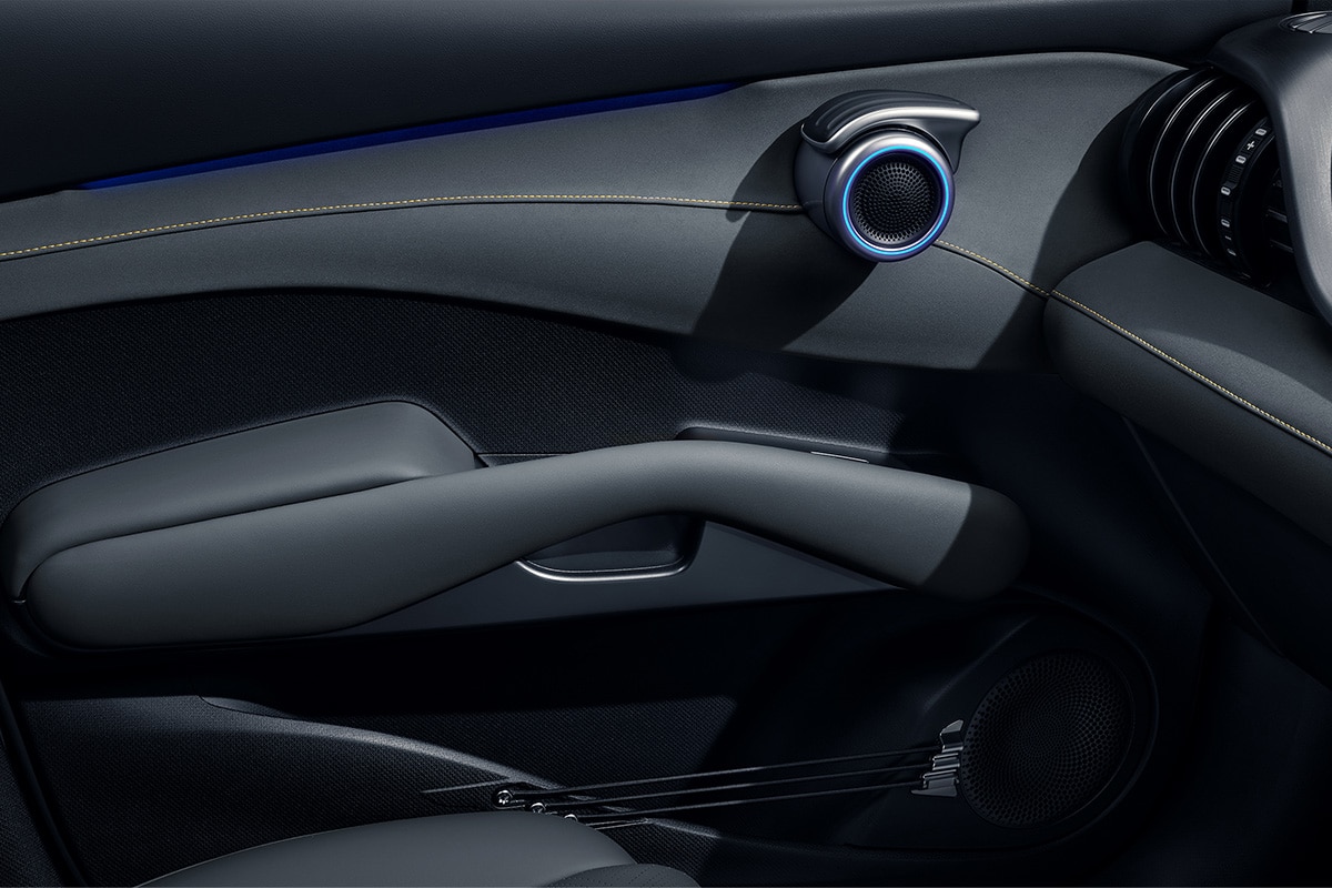 BYD ATTO 3 EVO interior door panel featuring signature guitar strings and circular door handle